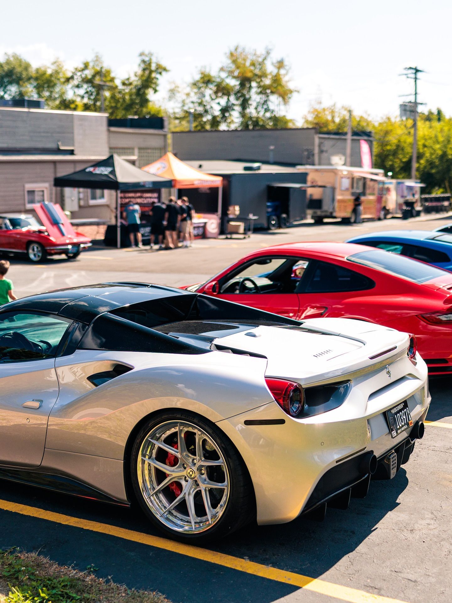 Luxury sports cars parked outdoors protected with PPF