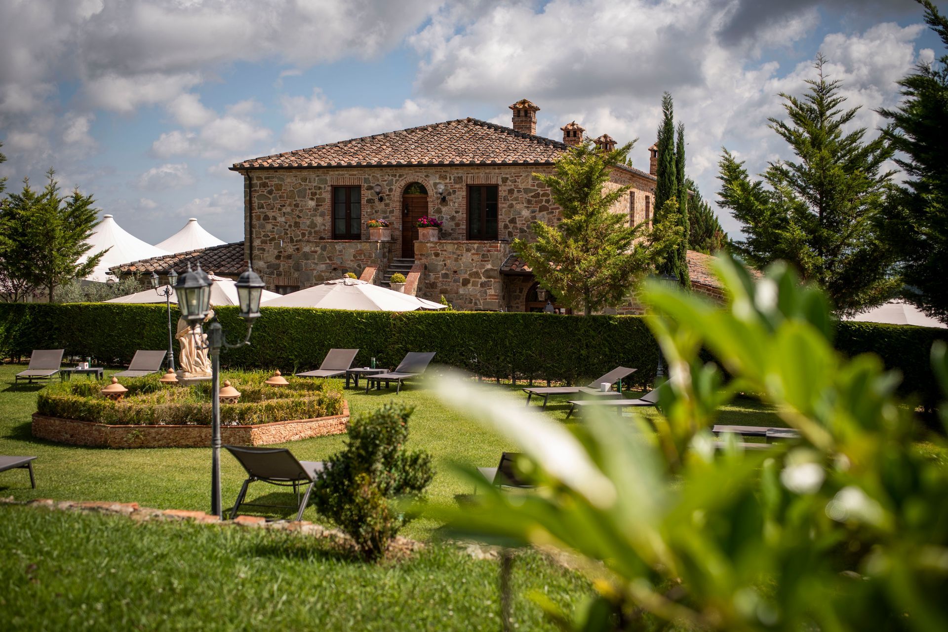A view of Poggio Paradiso from the 
Tuscan gardens.