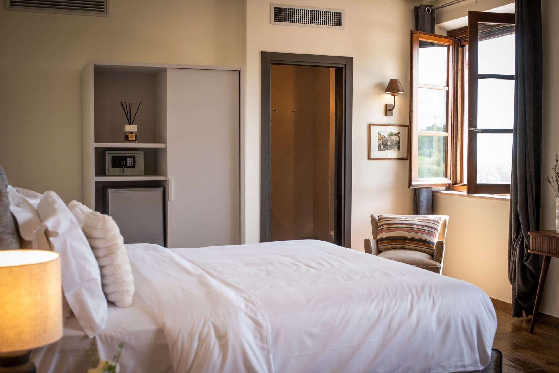 There is a large bed in the middle of the room.