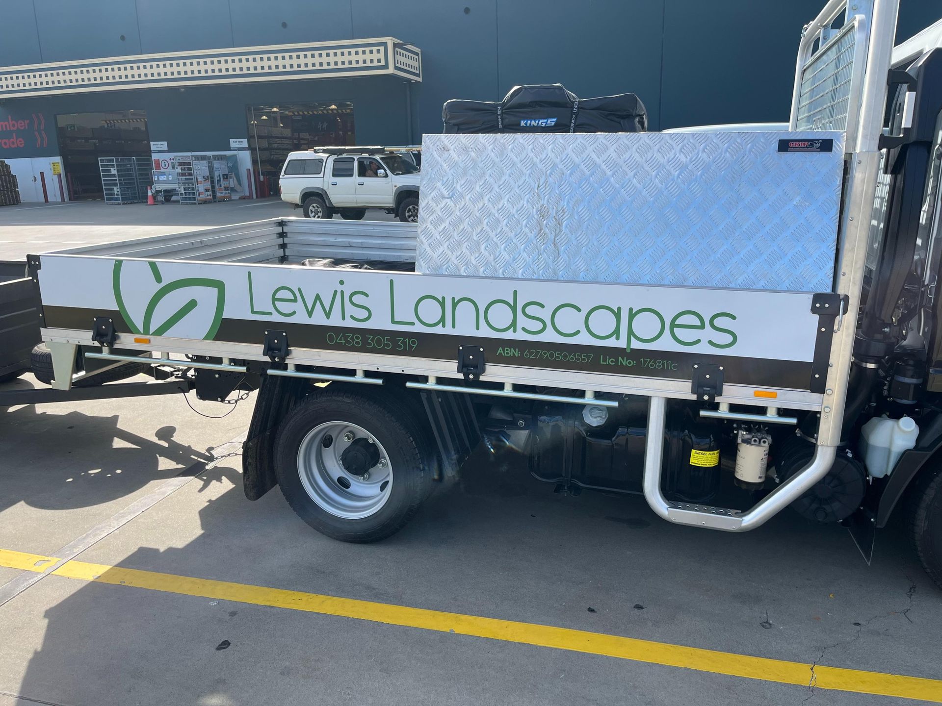 A Lewis Landscapes Truck Is Parked In A Parking Lot — Lewis Landscapes In Yippin Creek, NSW