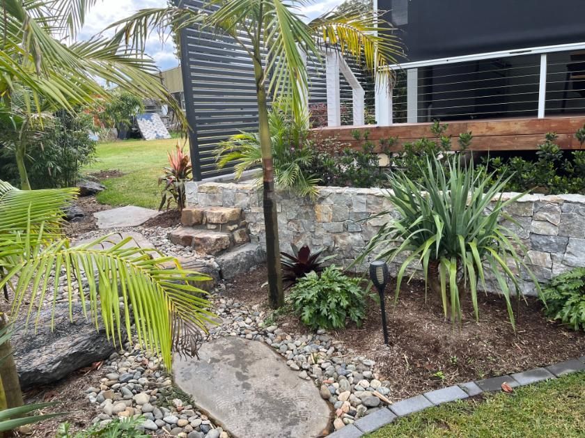 There Is A Stone Wall In The Middle Of The Garden — Lewis Landscapes In Yippin Creek, NSW