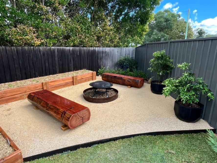 There Is A Fire Pit In The Middle Of The Backyard — Lewis Landscapes In Yippin Creek, NSW