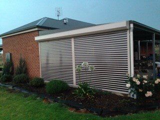 Outside View of Easy View Roller Shutter with Plants — Shutter in Darwin NT