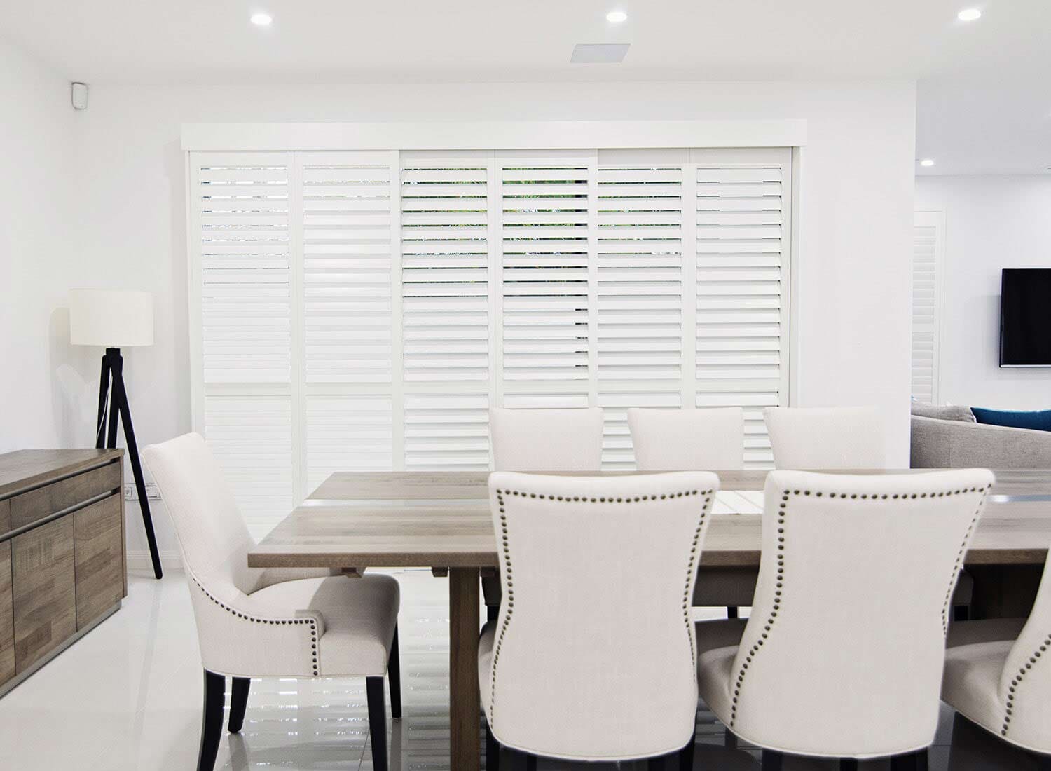 White blinds, white dining table — Blinds in Darwin NT