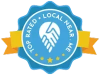 A blue seal with a yellow ribbon that says `` top rated local near me ''.