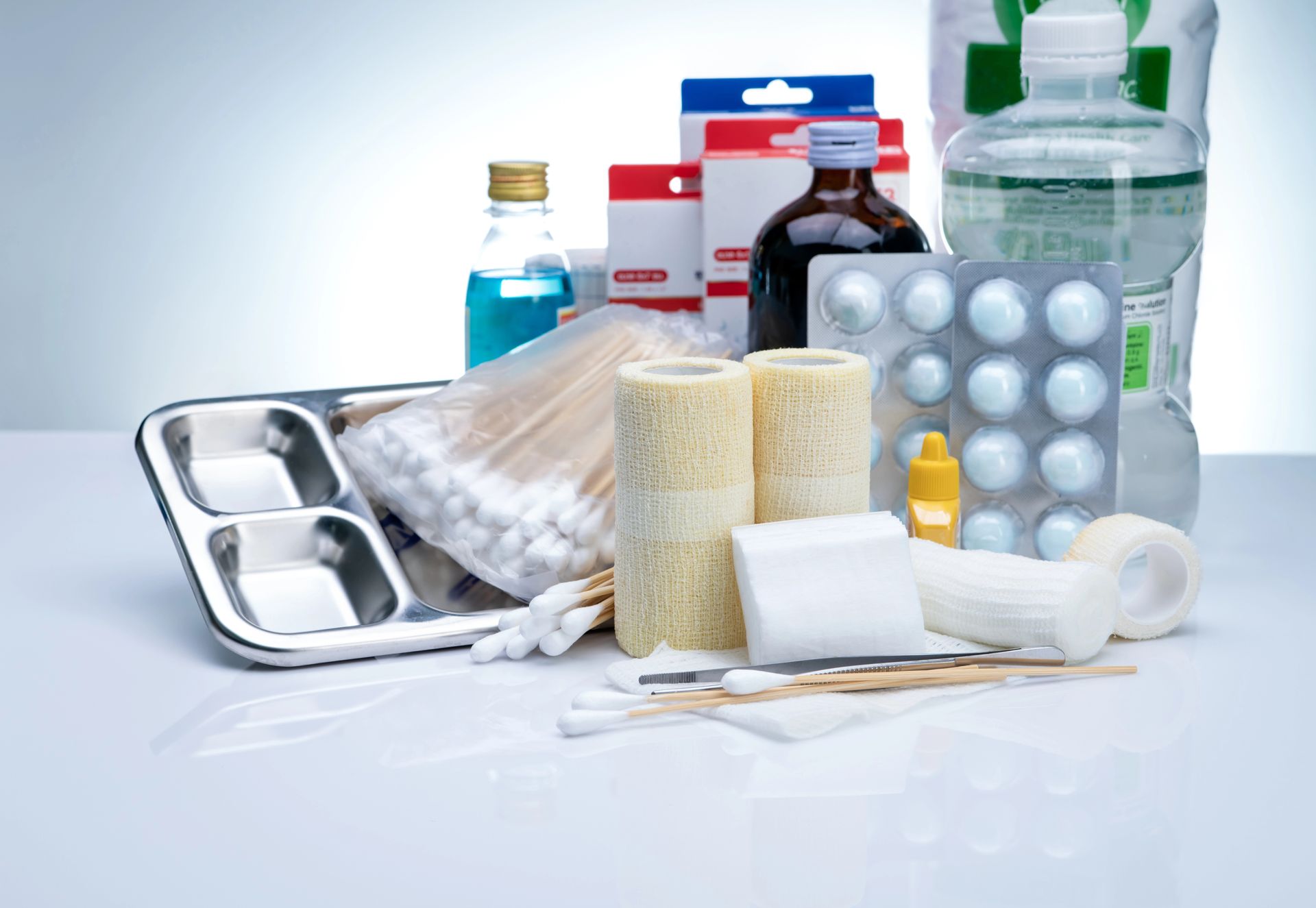 A variety of medical supplies are sitting on a table.