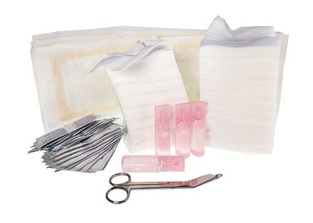 A pair of scissors sitting on top of a pile of tissues.