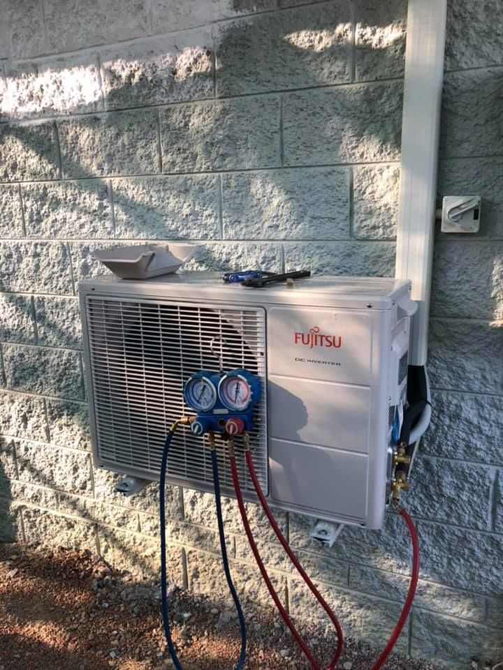 Electrician Making Connections Within the Switchboard — Licensed Residential Electrician in Townsville, QLD