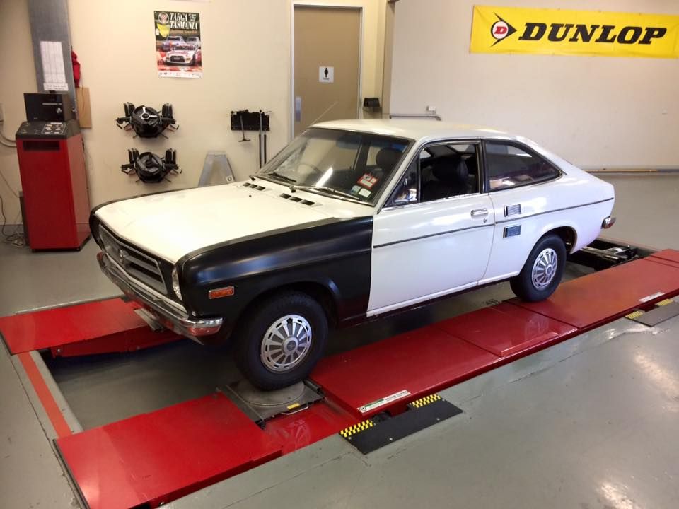 White Car Getting Wheel Repair — Rallimax Wheel Repairs & Alignments in Fyshwick, ACT