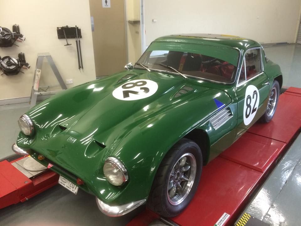 A Green Race Car With The Number 82 On It — Rallimax Wheel Repairs & Alignments in Junee, NSW