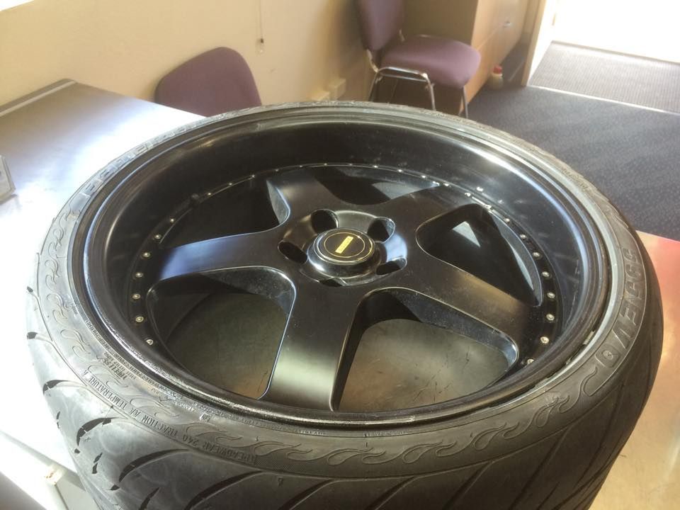 A Black Wheel On The Table — Rallimax Wheel Repairs & Alignments in Gundagai, NSW