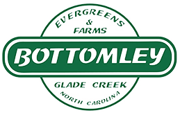 A logo for bottomley farms in north carolina