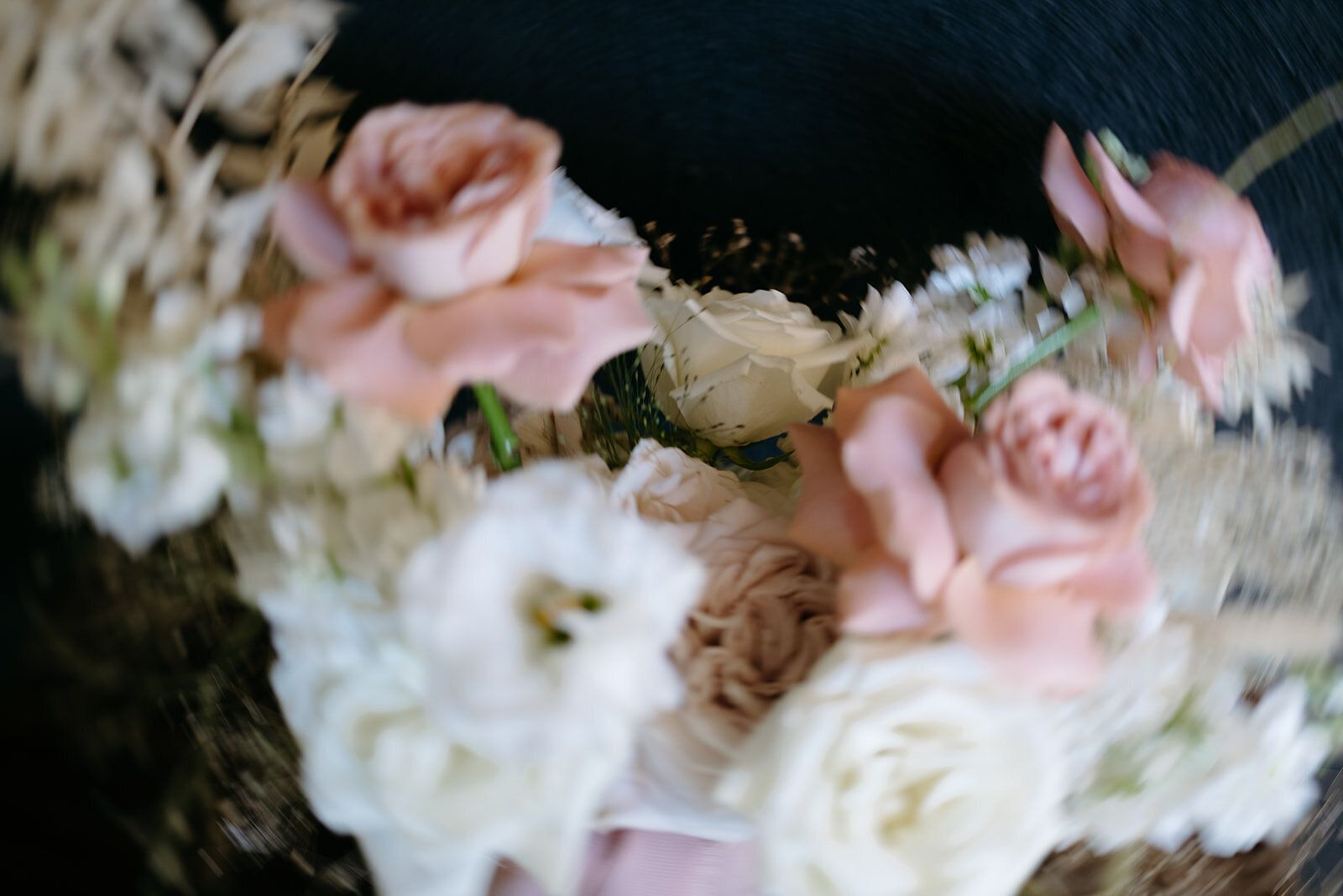 A close up of a bouquet of flowers on a table.