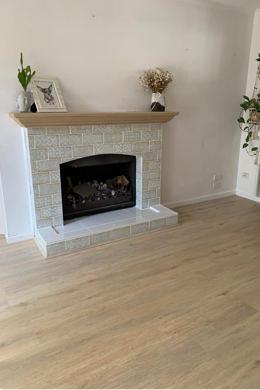 Fireplace With White and Gray Tiled Surround — Sunny Tiling Co in Mount Coolum, QLD