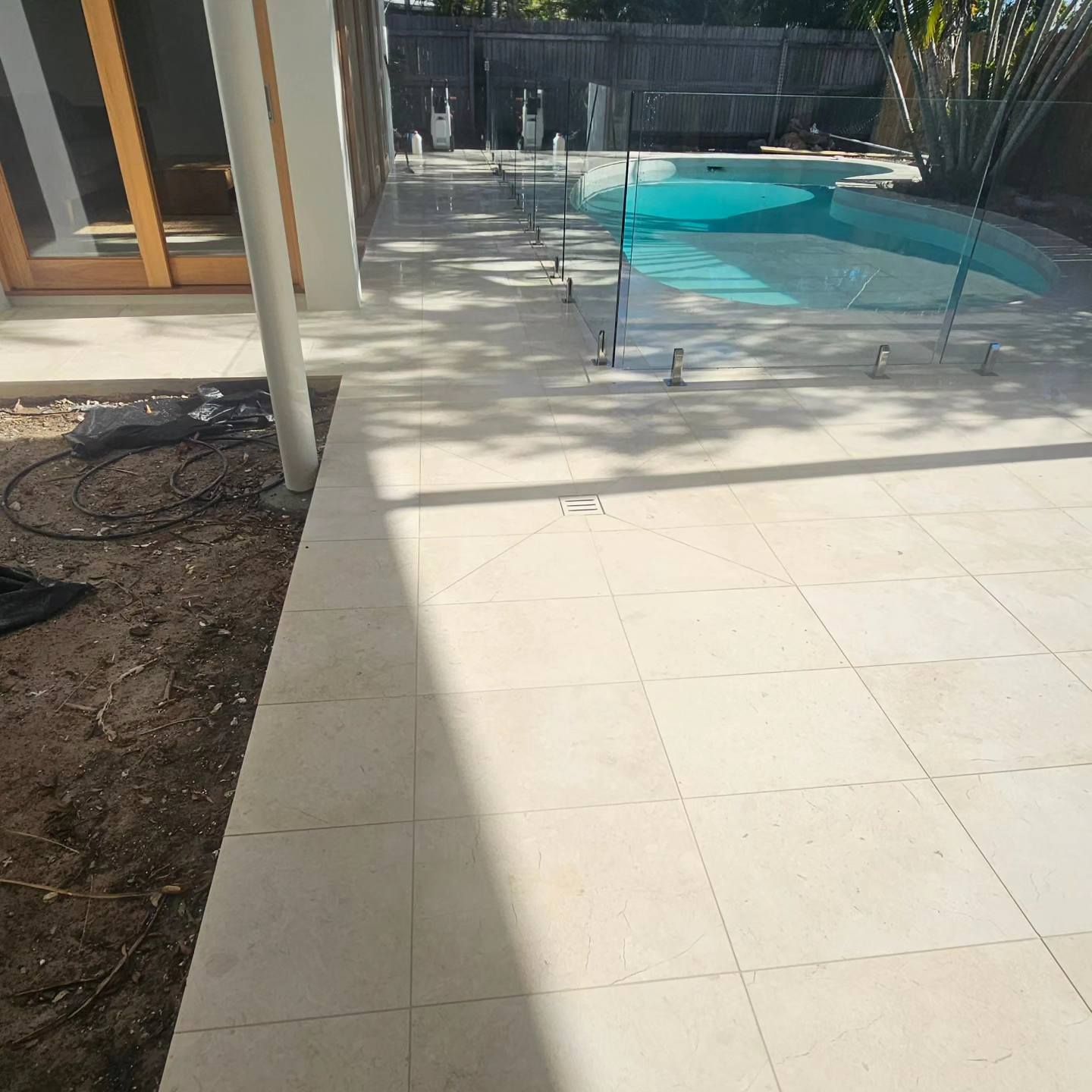 New Tiles Surrounding a Pool — Sunny Tiling Co in Mount Coolum, QLD