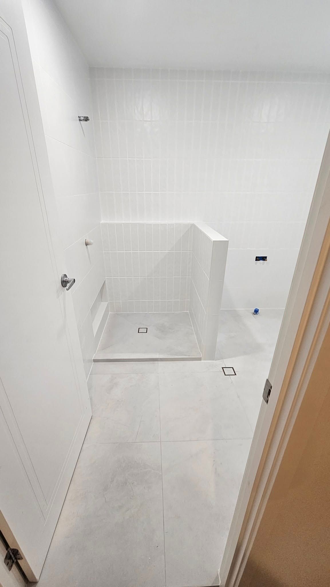 White Bathroom Freshly Tiled — Sunny Tiling Co in Mount Coolum, QLD