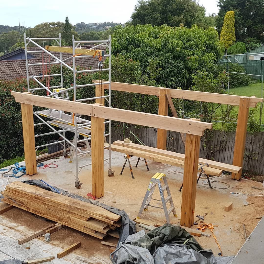 A Wooden Pergola Under Construction with Scaffolding — Coastline Building & Renovations In Forster, NSW