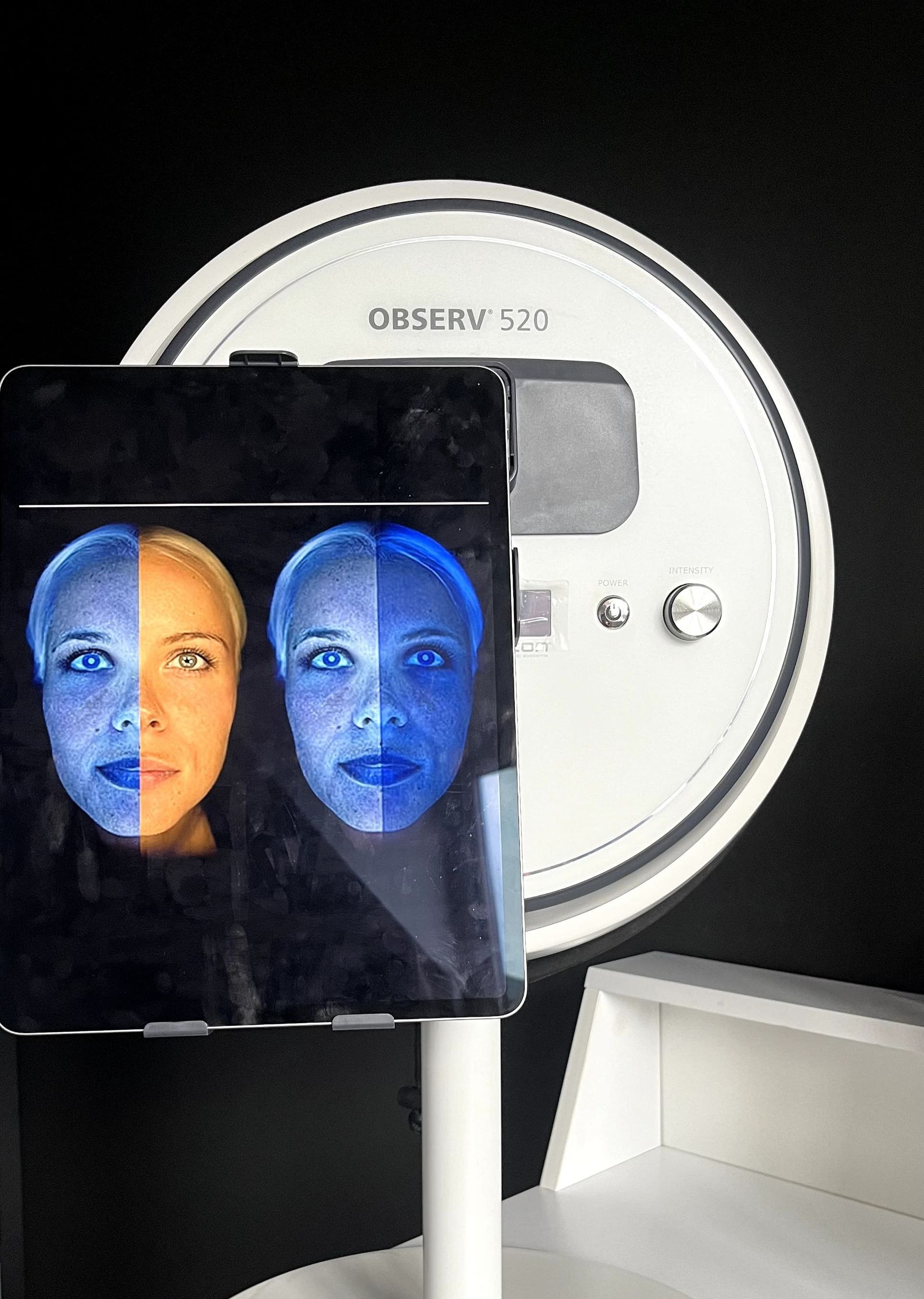 Wrinkless Clinic Patient picture beside the Observ skin scanner