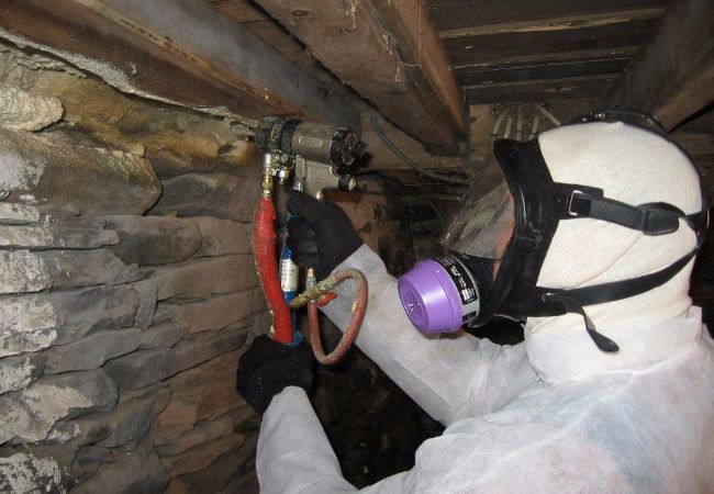 tech installing foam