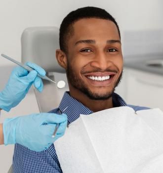 Man smiling during dental exam