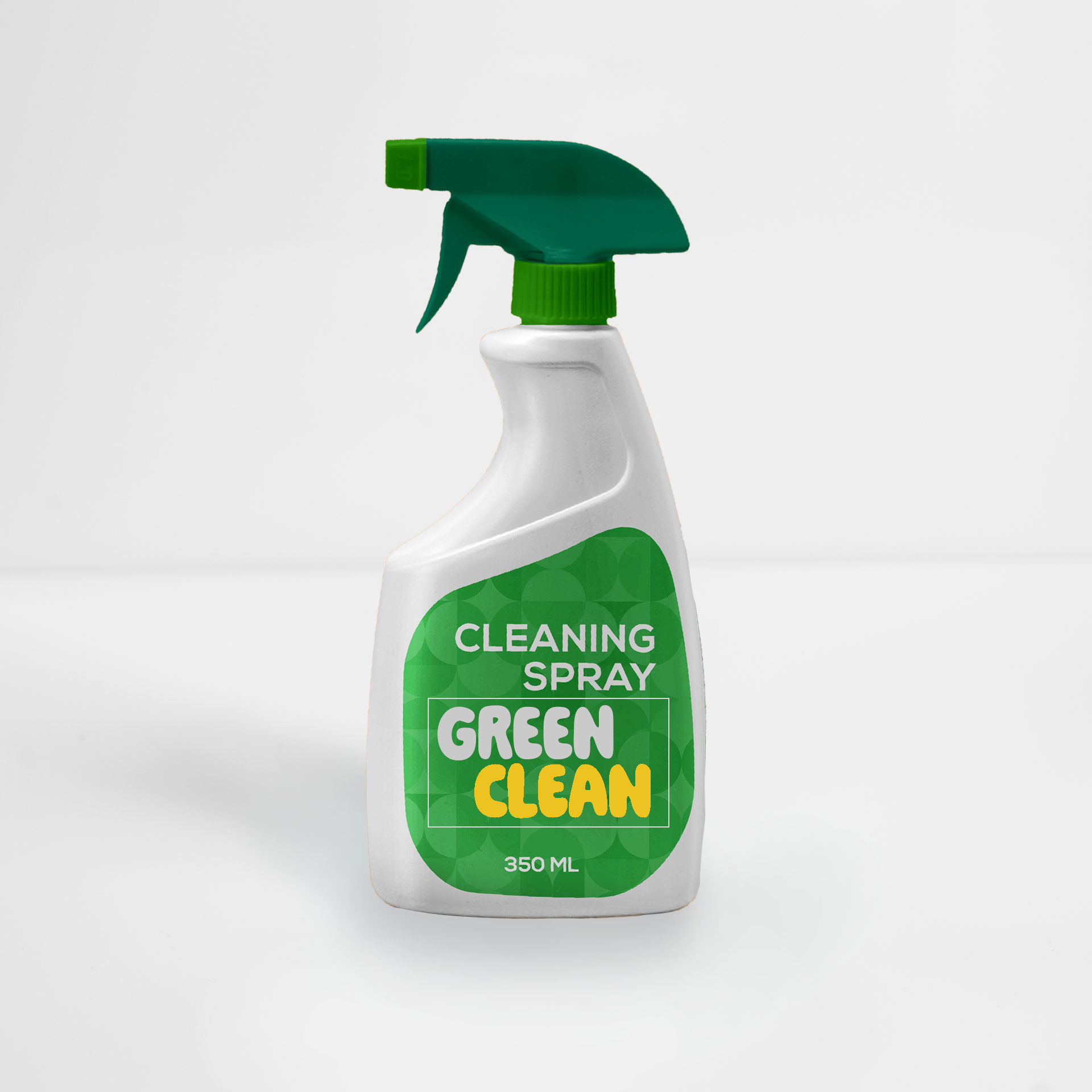 Green cleaning spray bottle with a white body and dark green trigger nozzle on a light background
