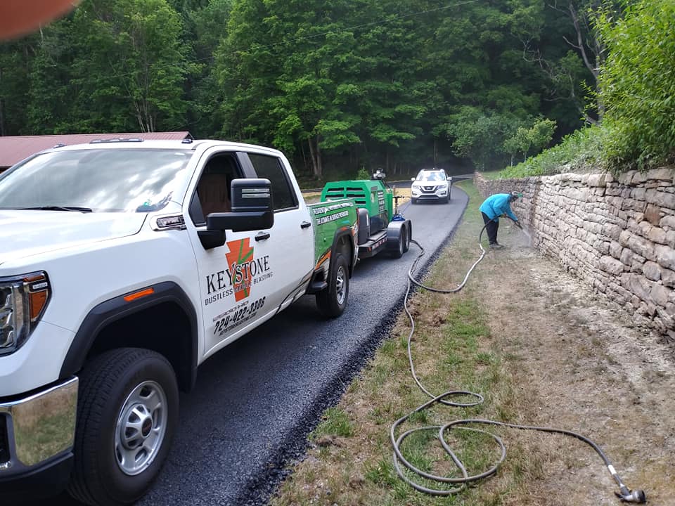 Keystone's Truck Parked Near the Retaining Wall — Indiana, PA — Keystone Dustless Mobile Media Blasting LLC