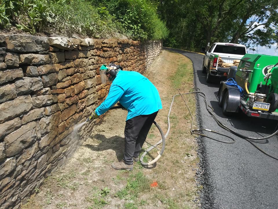 Ongoing Cleanup of the 600 Feet Retaining Wall — Indiana, PA — Keystone Dustless Mobile Media Blasting LLC
