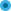 A blurred image of a blue circle on a white background.