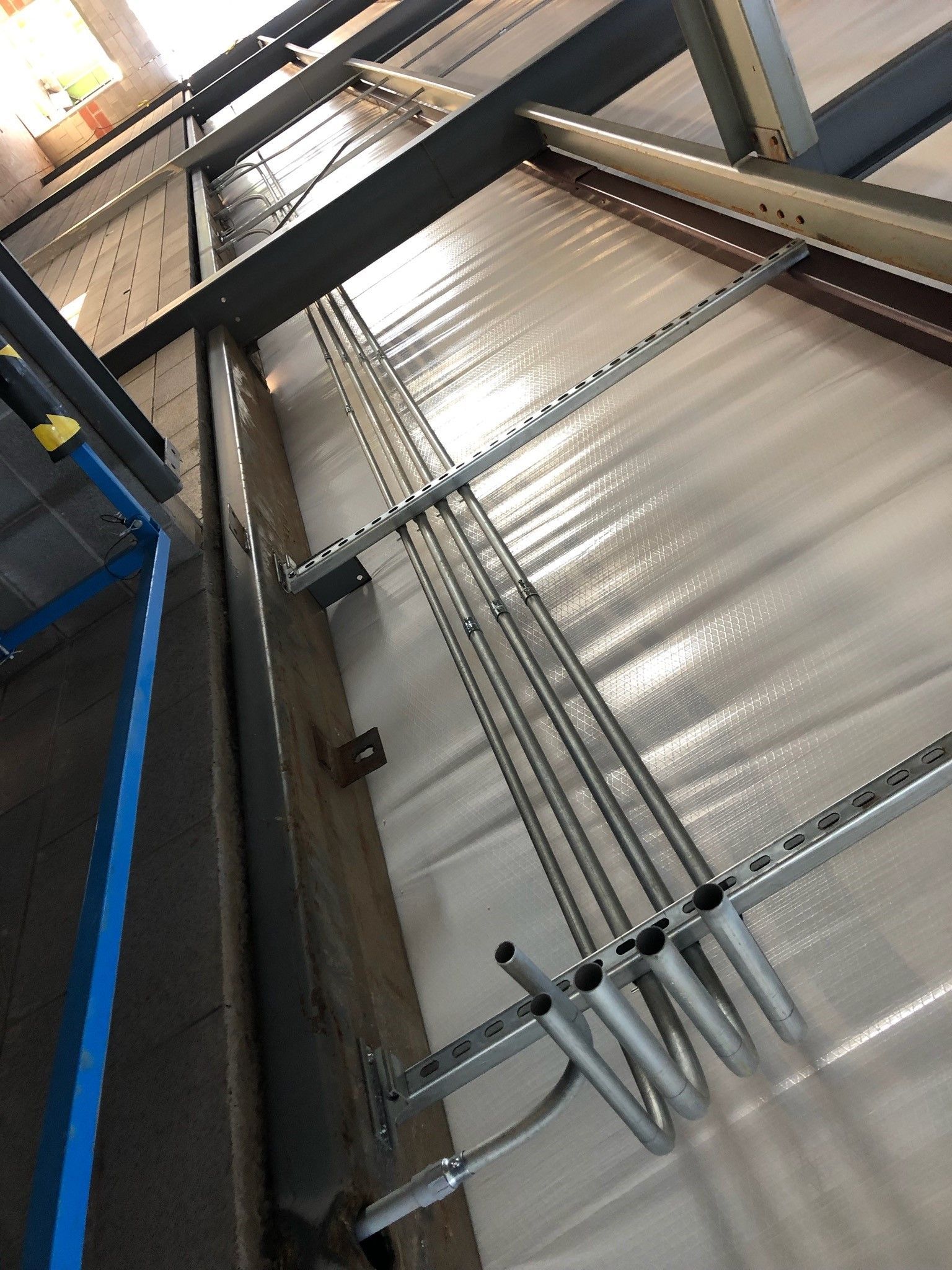 Pipes Hanging From The Wall Of A Building - Woodward, OK - Moyer Electric