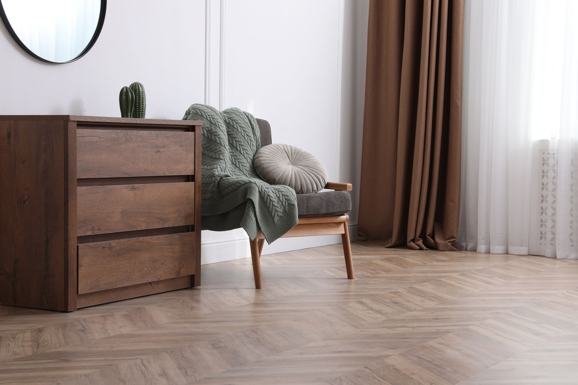 Contemporary living room with parquet flooring and elegant furniture arrangement