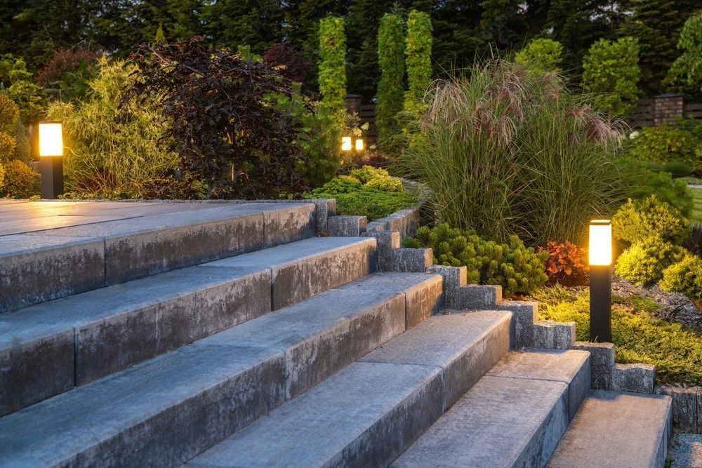 Stone steps leading up to a picturesque garden in a lovely home.