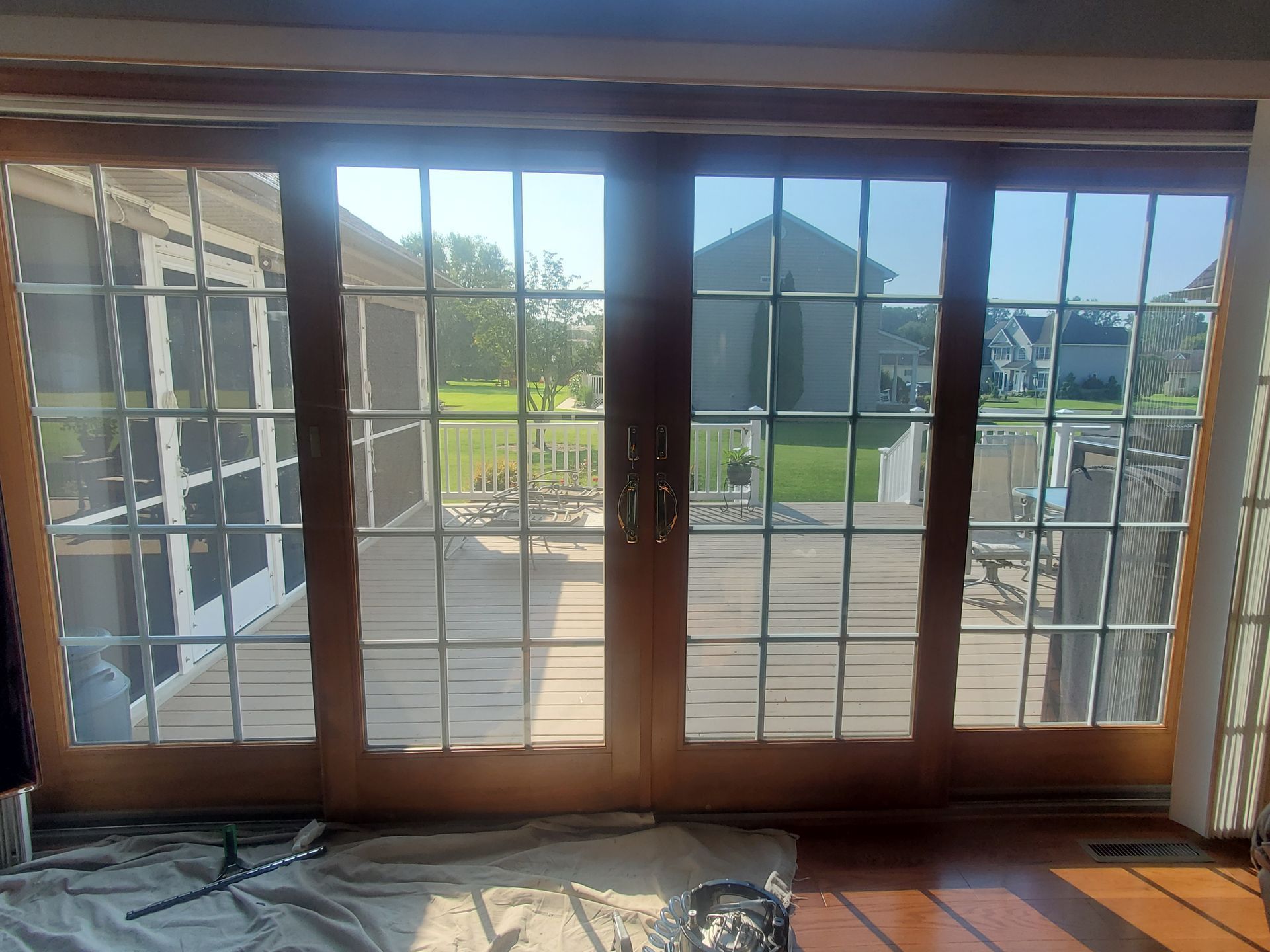 A living room with sliding glass doors leading to a deck.