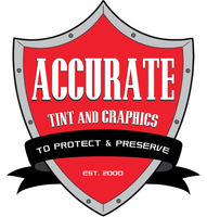 A red shield with the words accurate tint and graphics on it