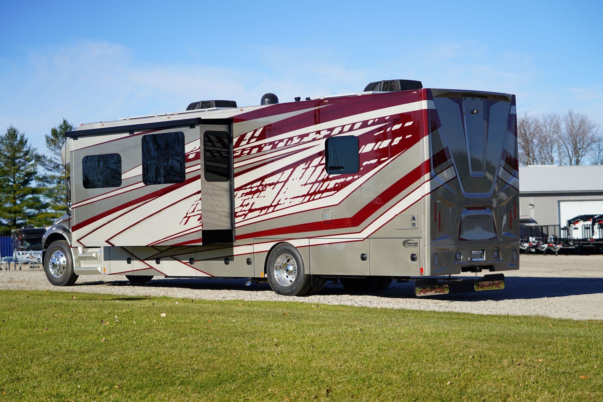 A man is working on a black lexus car