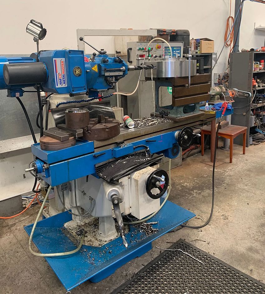 A Blue and White Machine in a Room — Hardarc Engineering in Coolum Beach, QLD