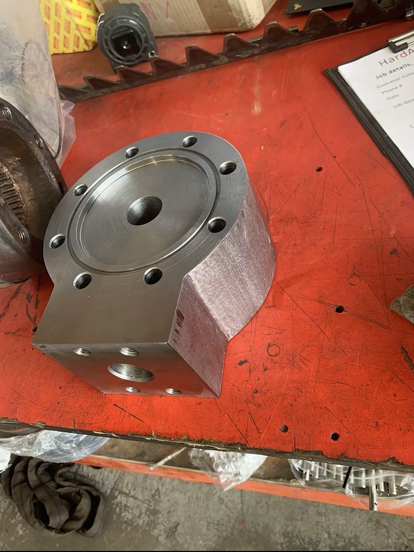 A Piece of Metal on Top of a Red Table — Hardarc Engineering in Warwick, QLD