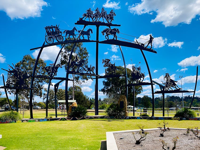 A Statue of Horses Pulling a Carriage in a Park — Hardarc Engineering in Warwick, QLD