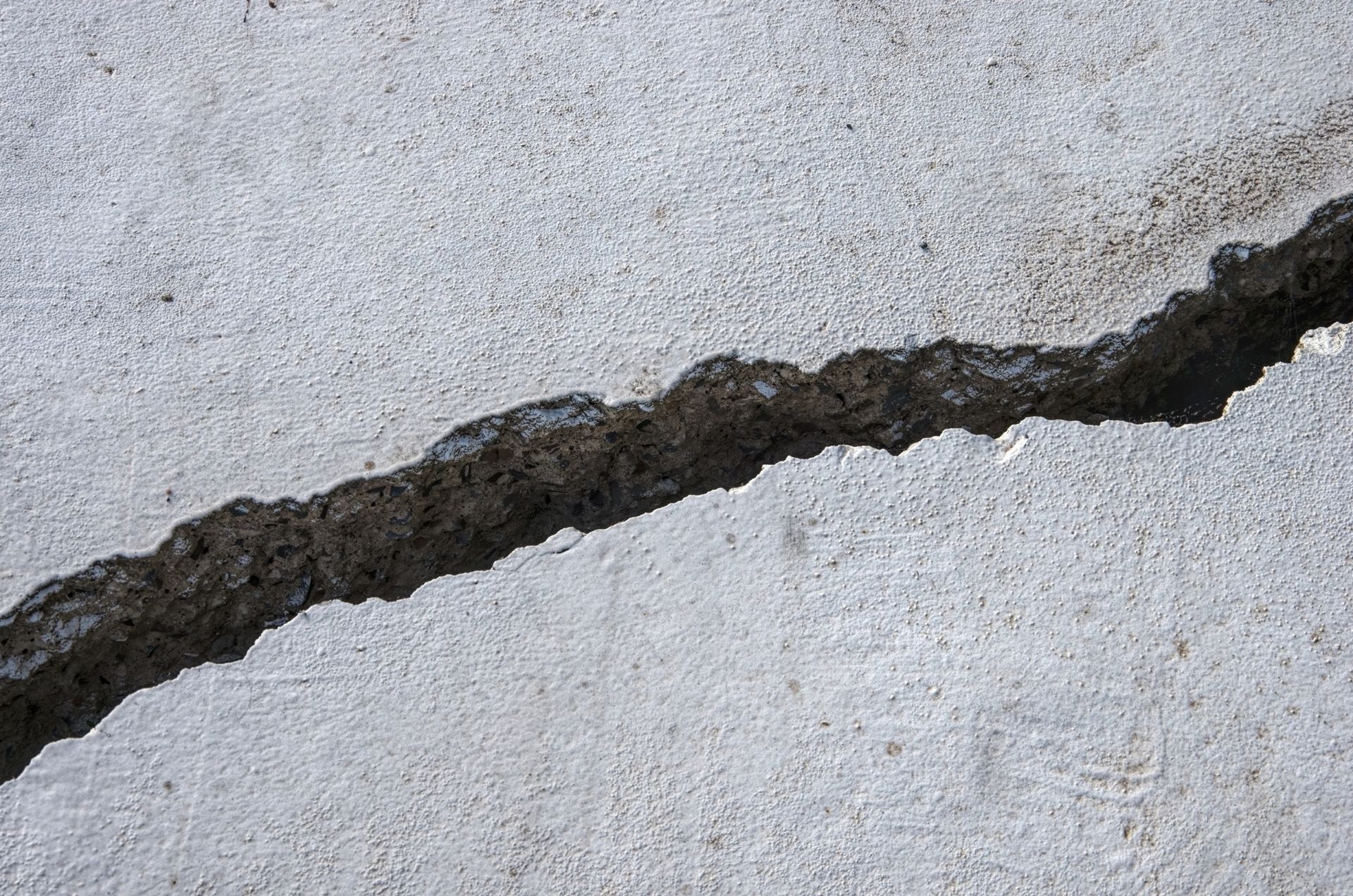 A large crack on a foundation. A large crack on a foundation.