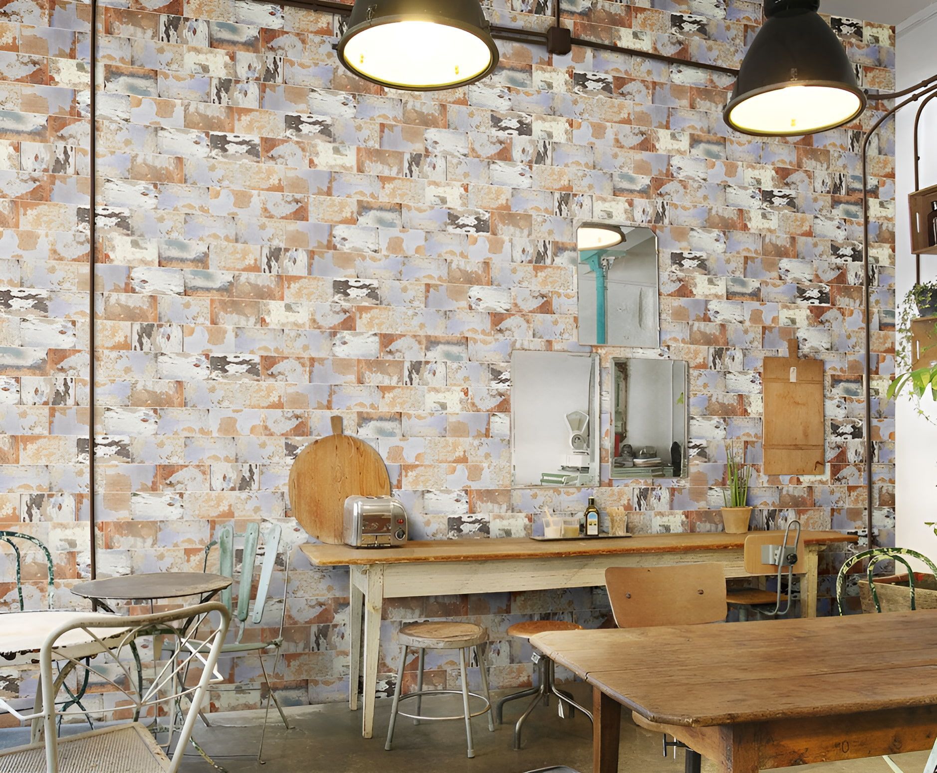 A Restaurant With Tables And Chairs And A Brick Wall — Mid Coast Tiles Urunga In Urunga, NSW