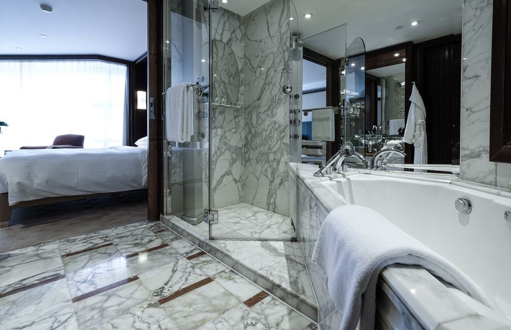 A Bathroom In A Hotel Room — Mid Coast Tiles Urunga In Urunga, NSW