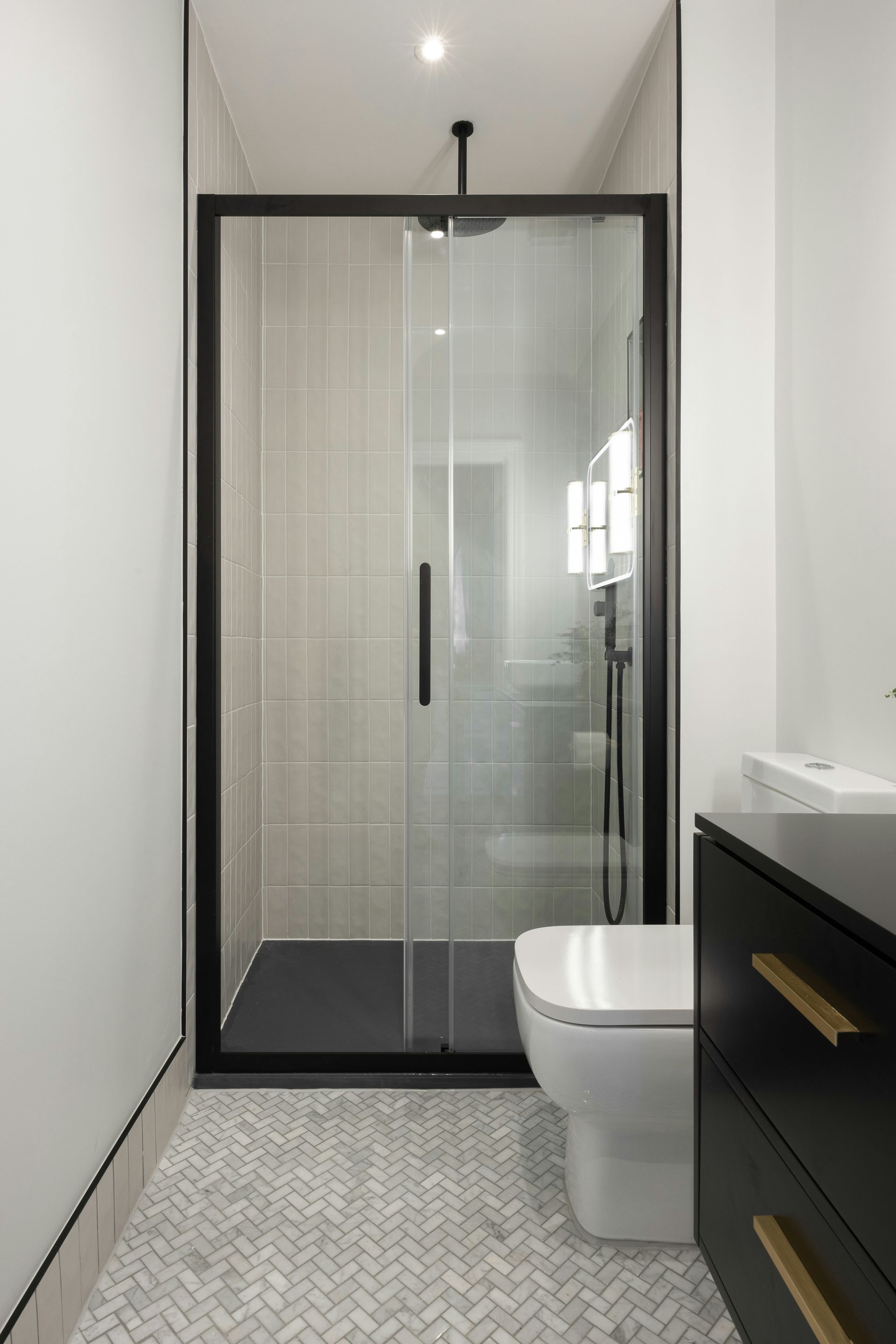 Narrow Modern Bathroom With a Black-framed Shower — Mid Coast Tiles Urunga In Urunga, NSW