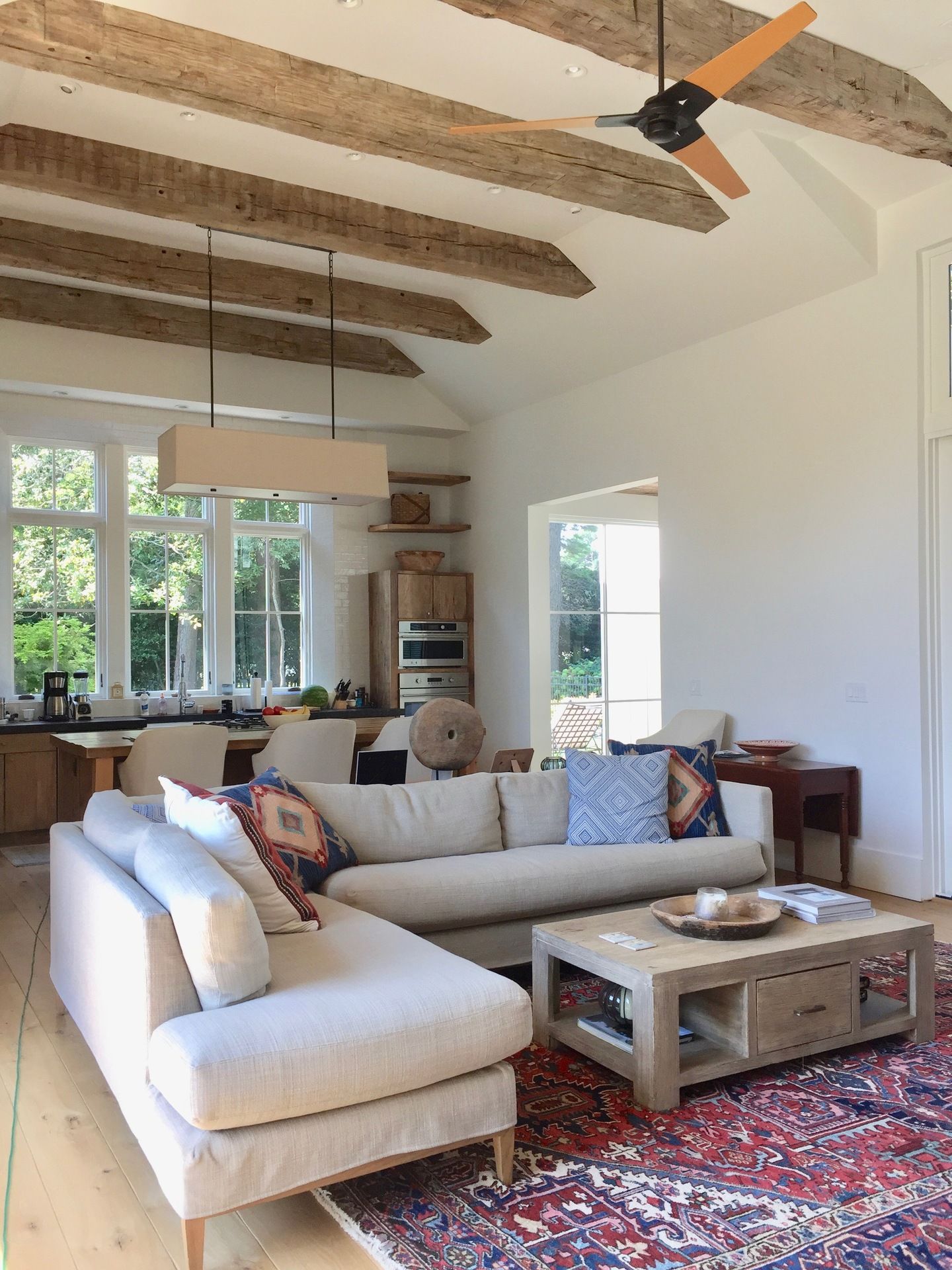 A living room with a couch and a coffee table