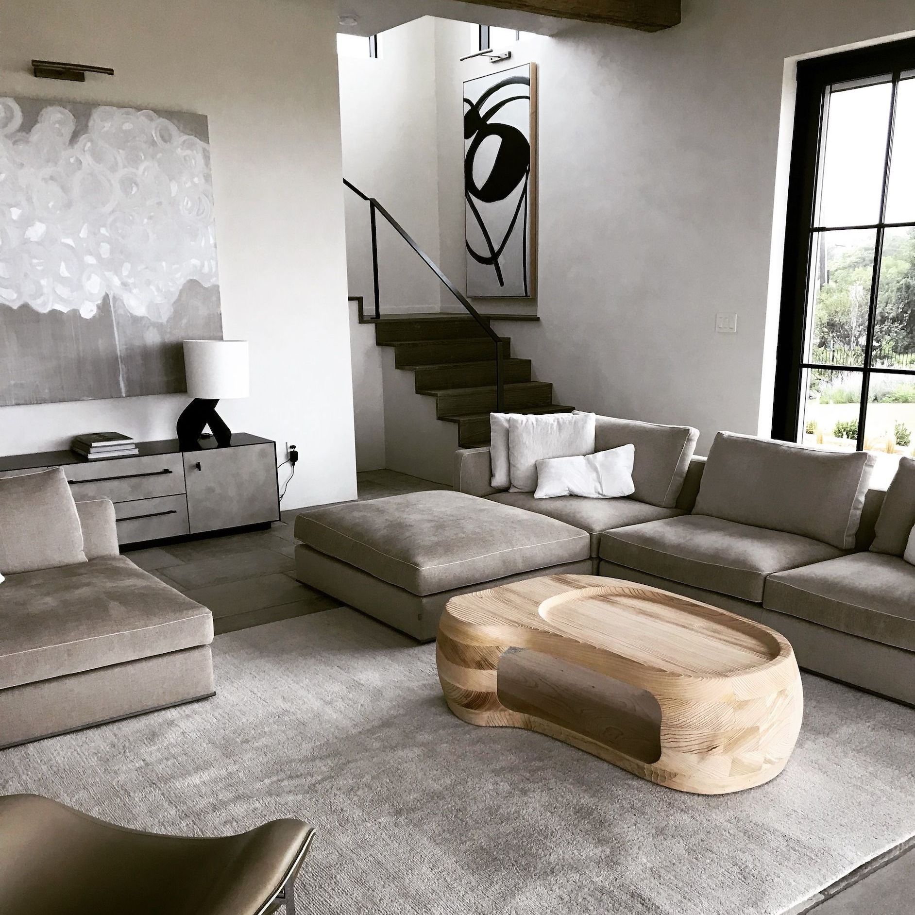 A living room with a couch and a coffee table
