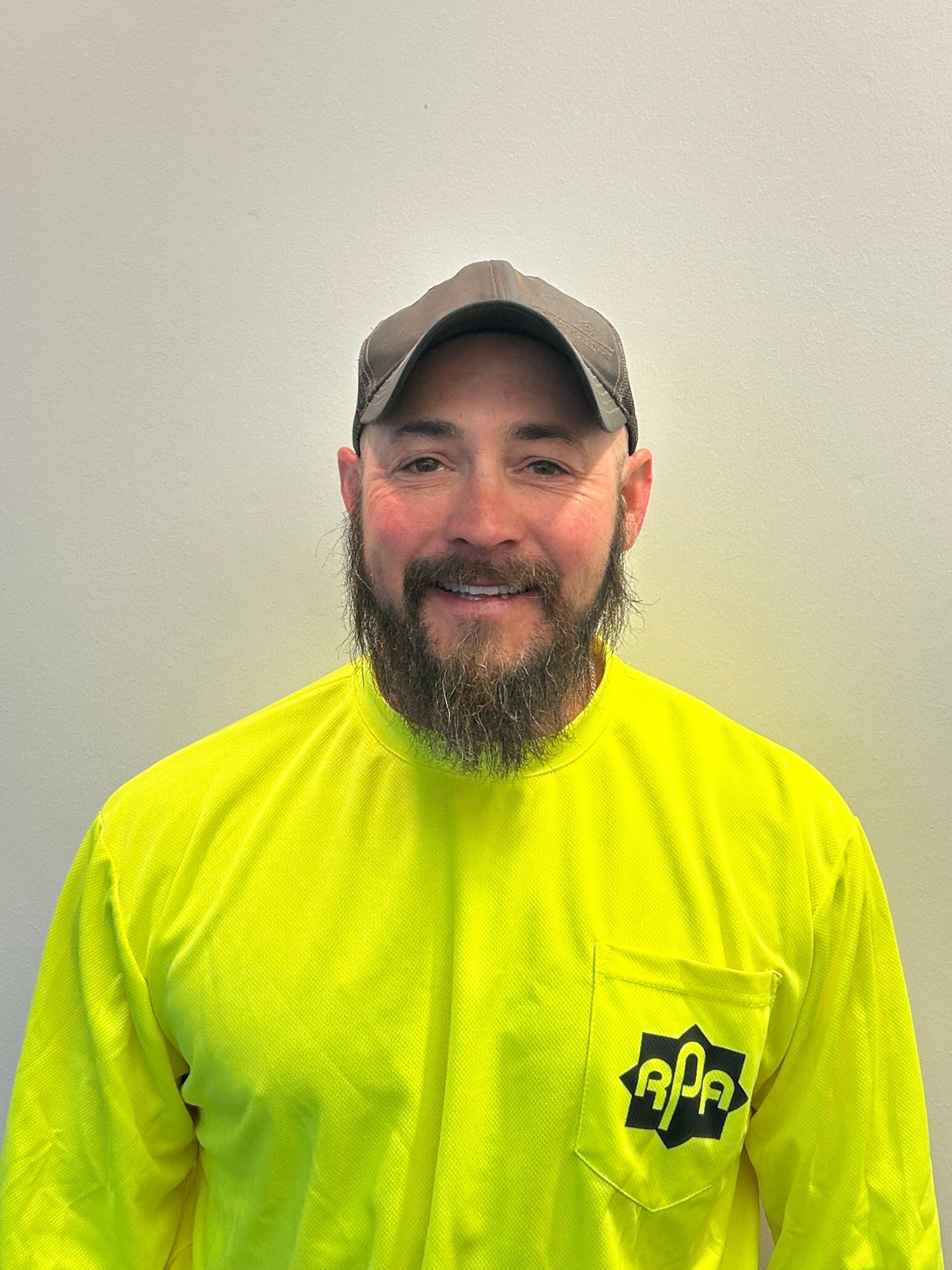 A gray silhouette of a person without a face on a white background.