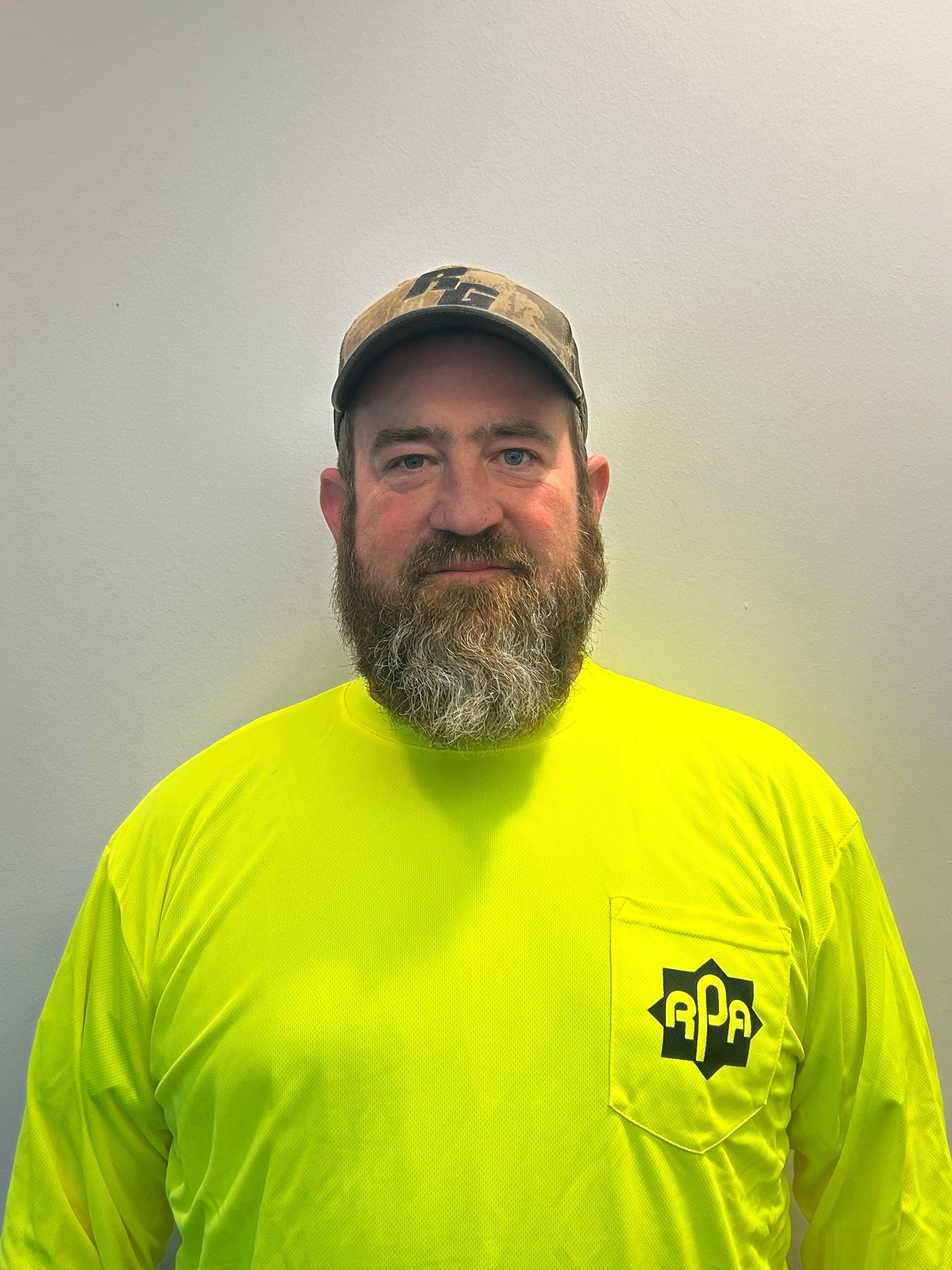 A gray silhouette of a person without a face on a white background.