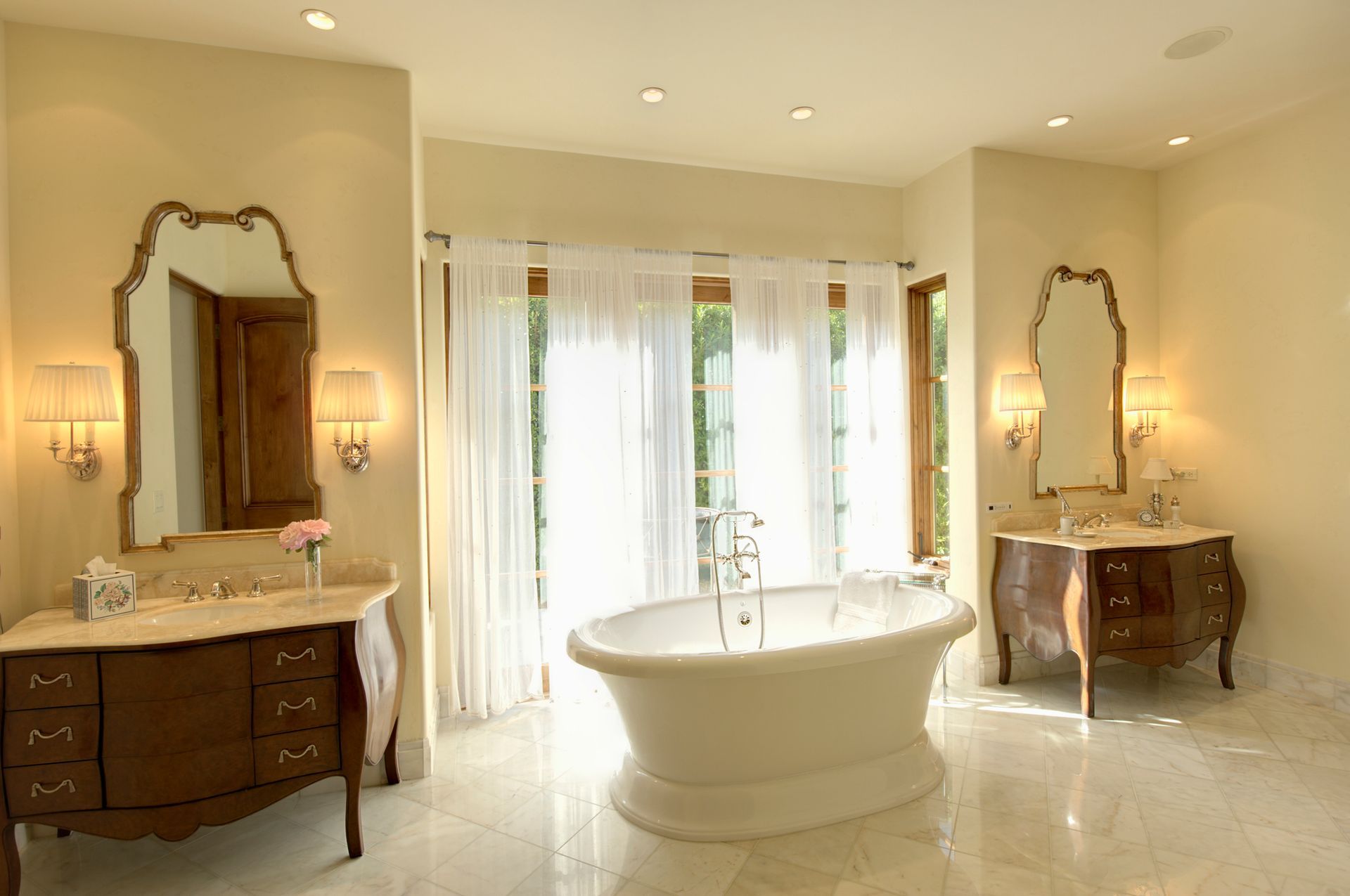 Luxury bathroom plumbing remodel in Chippewa Falls, WI with a freestanding tub, vintage decor.