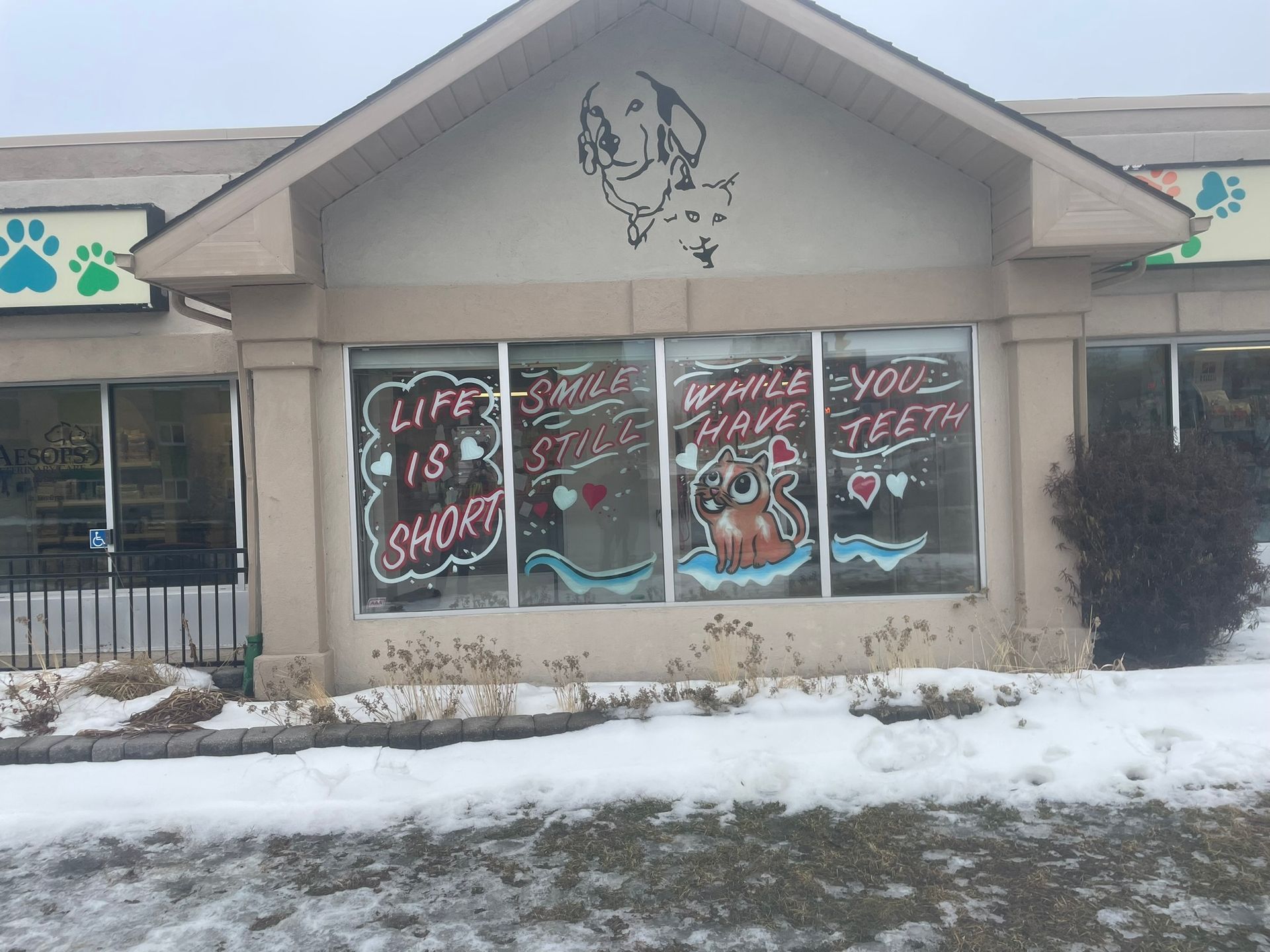 A building with a sign that says life is short