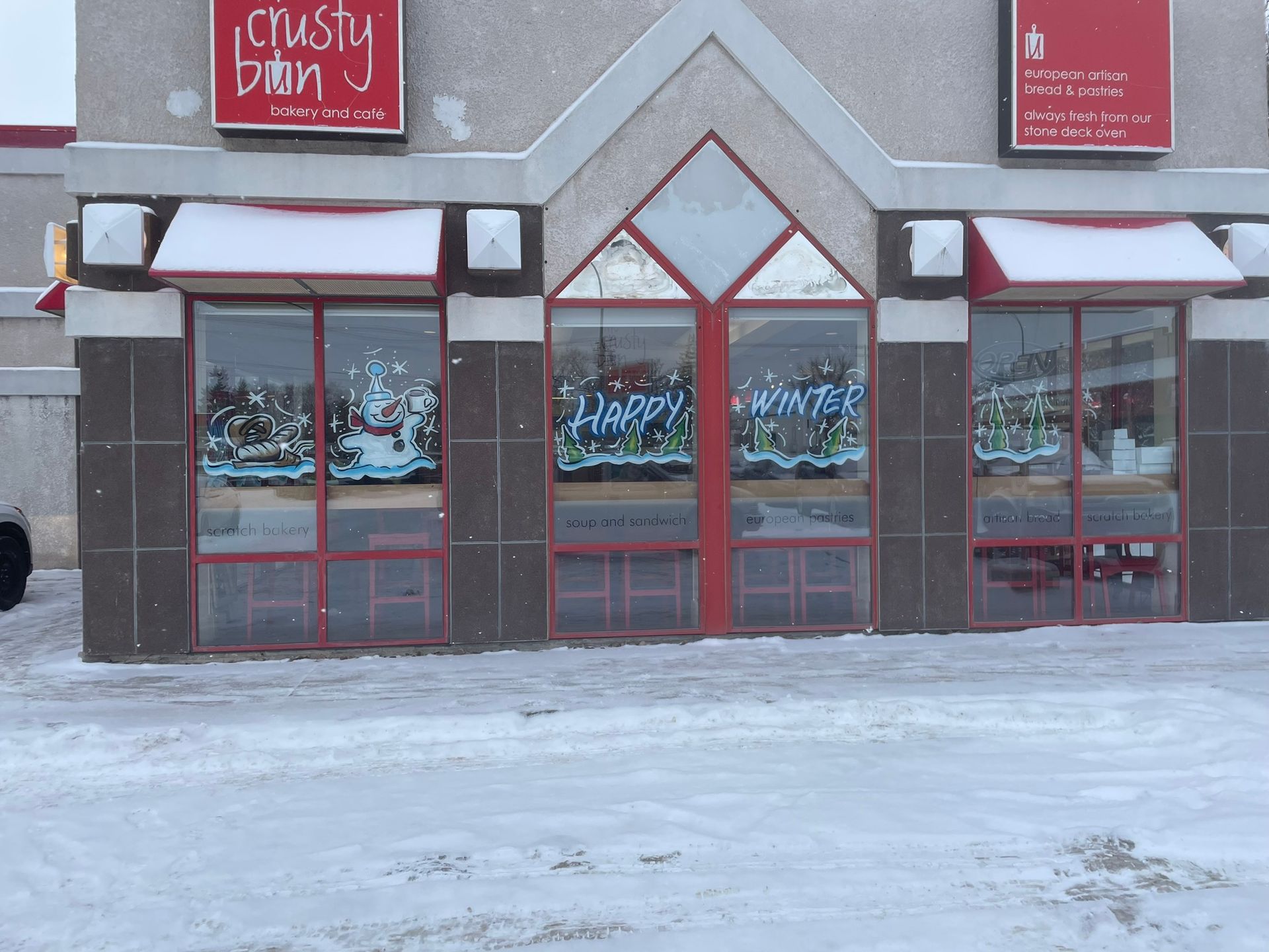 A building with a sign that says crusty dawn