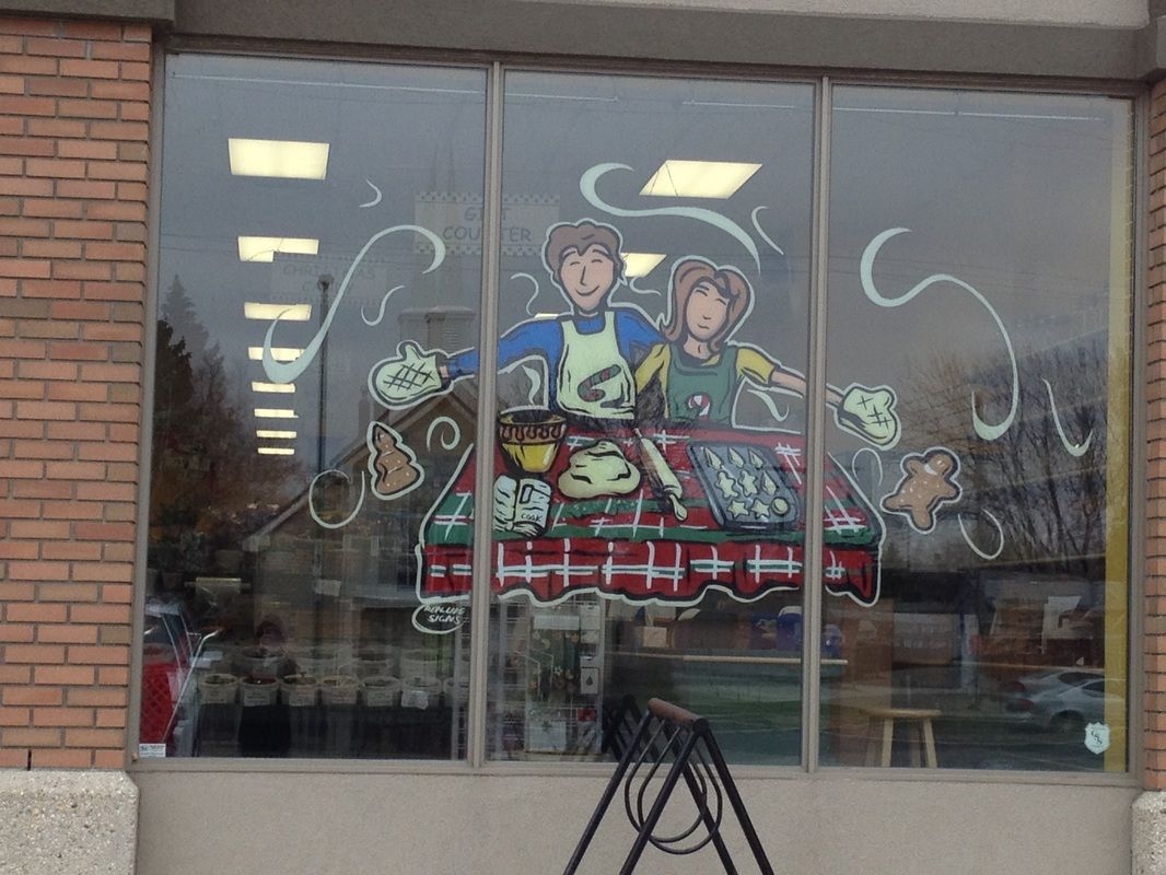 A window with a drawing of a man and woman on it