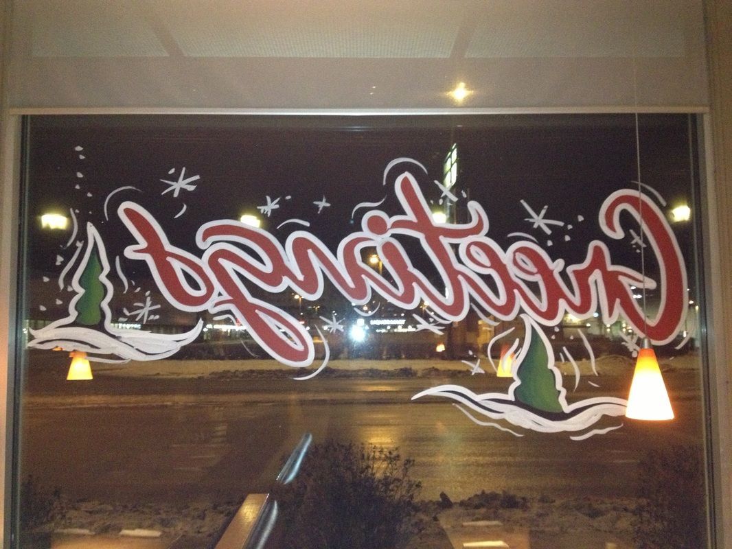 A window with the word imagination painted on it